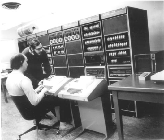 Ken Thompson and Dennis Ritchie at a PDP-11 computer